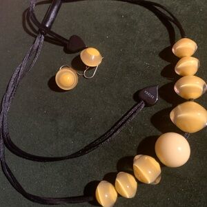 Yellow fashionable necklace with pierced earrings
